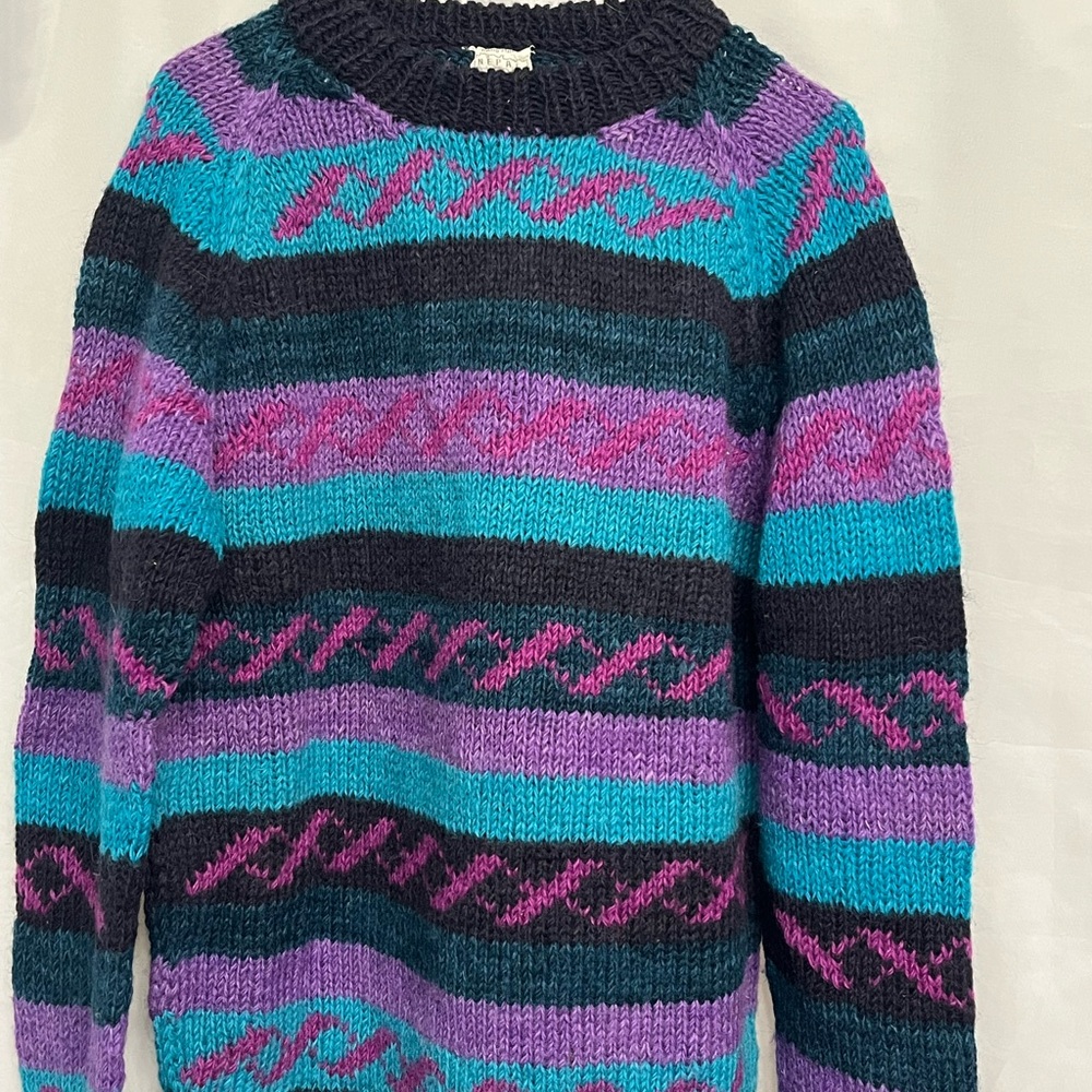 Made in Nepal Wool Crew neck sweater.